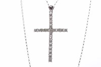 Lot 44 - EIGHTEEN CARAT WHITE GOLD DIAMOND SET CROSS...