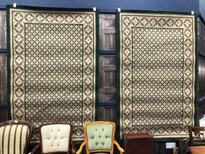 Lot 151 - A PAIR OF 20TH CENTURY GREEN AND WHITE RUGS