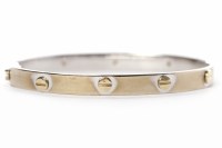 Lot 45 - NINE CARAT GOLD BANGLE in white gold, with...