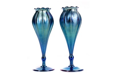Lot 766 - A PAIR OF L. C. TIFFANY BLUE FAVRILE VASES