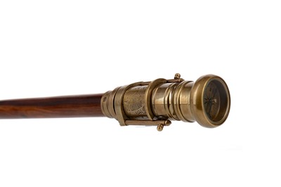 Lot 1731 - A REPRODUCTION BRASS AND HARDWOOD WALKING CANE