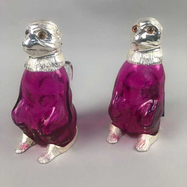 Lot 19 - A PAIR OF BIRD FORMED DECANTERS