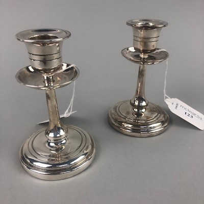 Lot 123 - A PAIR OF SILVER CANDLESTICKS