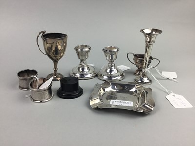 Lot 125 - A LOT OF SMALL SILVER ITEMS, INCLUDING CANDLESTICKS, TROPHY AND VASE