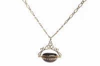 Lot 59 - SWIVEL FOB set with a section of tiger's eye...