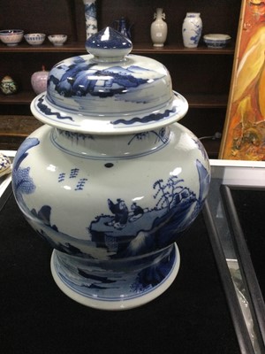 Lot 672 - A 19TH CENTURY CHINESE BLUE AND WHITE VASE WITH COVER