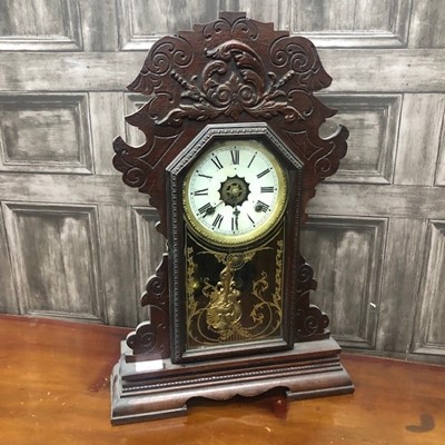 Lot 267 - A LATE 19TH CENTURY AMERICAN OAK GINGERBREAD CLOCK