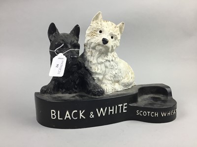 Lot 92 - A BLACK AND WHITE SCOTCH WHISKY ADVERTISING MODEL