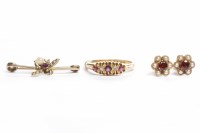 Lot 72 - VICTORIAN EIGHTEEN CARAT GOLD RUBY AND DIAMOND...