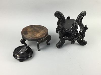 Lot 103 - A PAIR OF EASTERN EBONISED CARVED WOOD BOWL STANDS AND TWO OTHERS