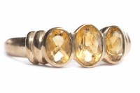 Lot 77 - NINE CARAT GOLD DRESS RING set with three oval...