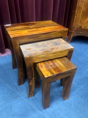 Lot 281 - A STAINED WOOD NEST OF THREE TABLES