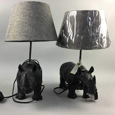 Lot 283 - A PAIR OF TABLE LAMPS MODELLED AS RHINOS WITH SHADES