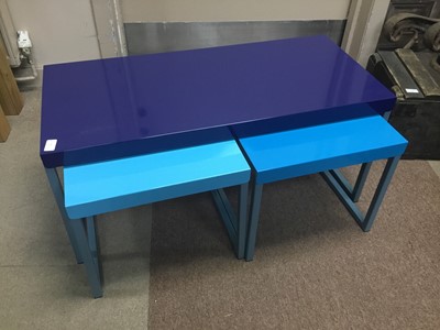 Lot 285 - A MODERN NEST OF THREE TABLES