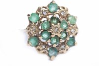 Lot 81 - EMERALD AND DIAMOND CLUSTER RING set with...