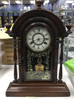 Lot 381 - AN AMERICAN WALNUT MANTEL CLOCK