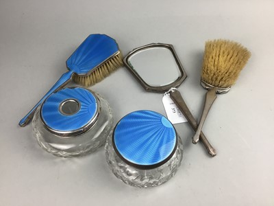 Lot 373 - A COMPOSITE SILVER PLATED AND GUILLOCHE ENAMEL DRESSING TABLE SET