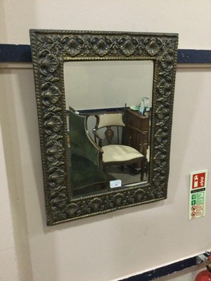 Lot 348 - A BRASS FRAMED WALL MIRROR