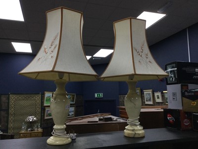 Lot 308 - A PAIR OF ONYX TABLE LAMPS WITH SHADES