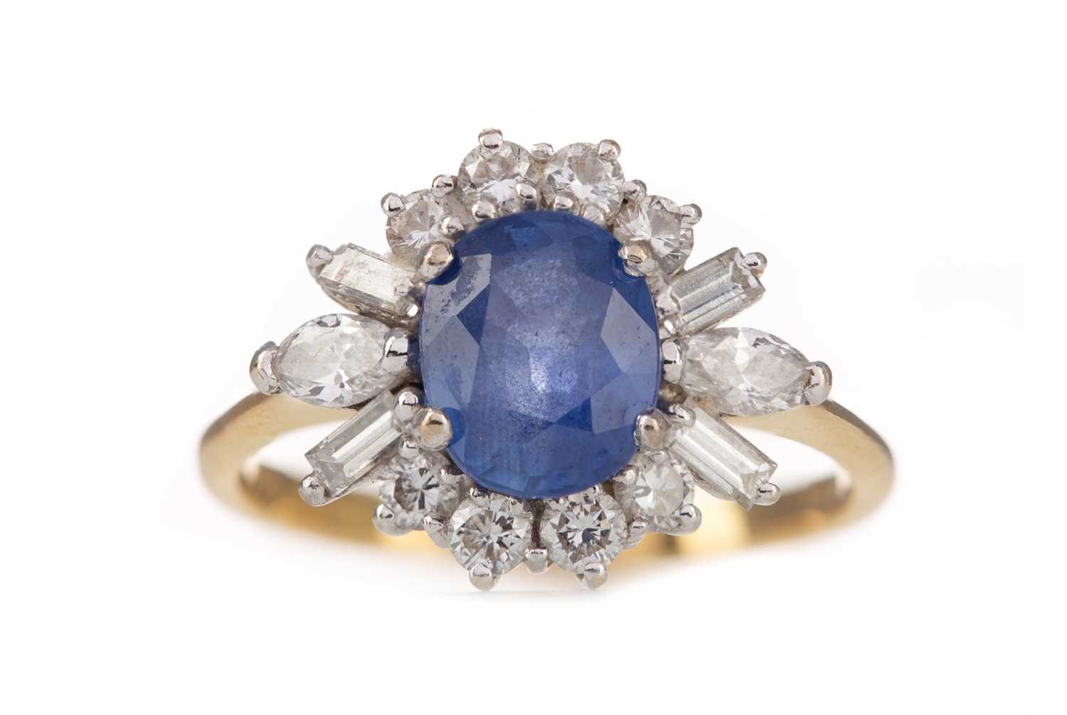 Lot 315 - A SAPPHIRE AND DIAMOND CLUSTER RING