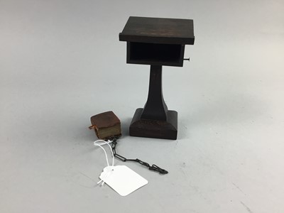 Lot 330 - A MINIATURE HOLY BIBLE ON CHAIN WITH LECTERN