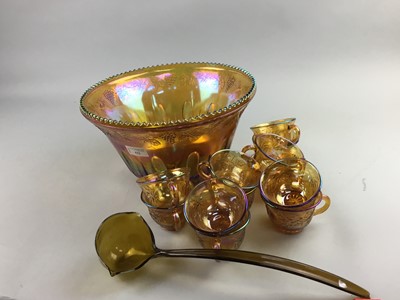 Lot 522 - A CARNIVAL GLASS PUNCH BOWL WITH TWELVE CUPS