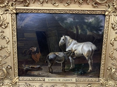 Lot 98 - A HORSE, DONKEY AND A LADY BEFORE A COUNTRY COTTAGE, AN OIL ATTRIBUTED TO KAREL DU JARDIN