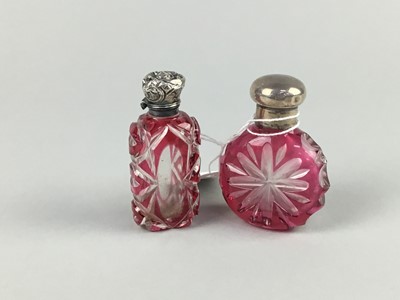 Lot 432 - A LOT OF TWO SILVER TOPPED CRANBERRY GLASS SCENT BOTTLES