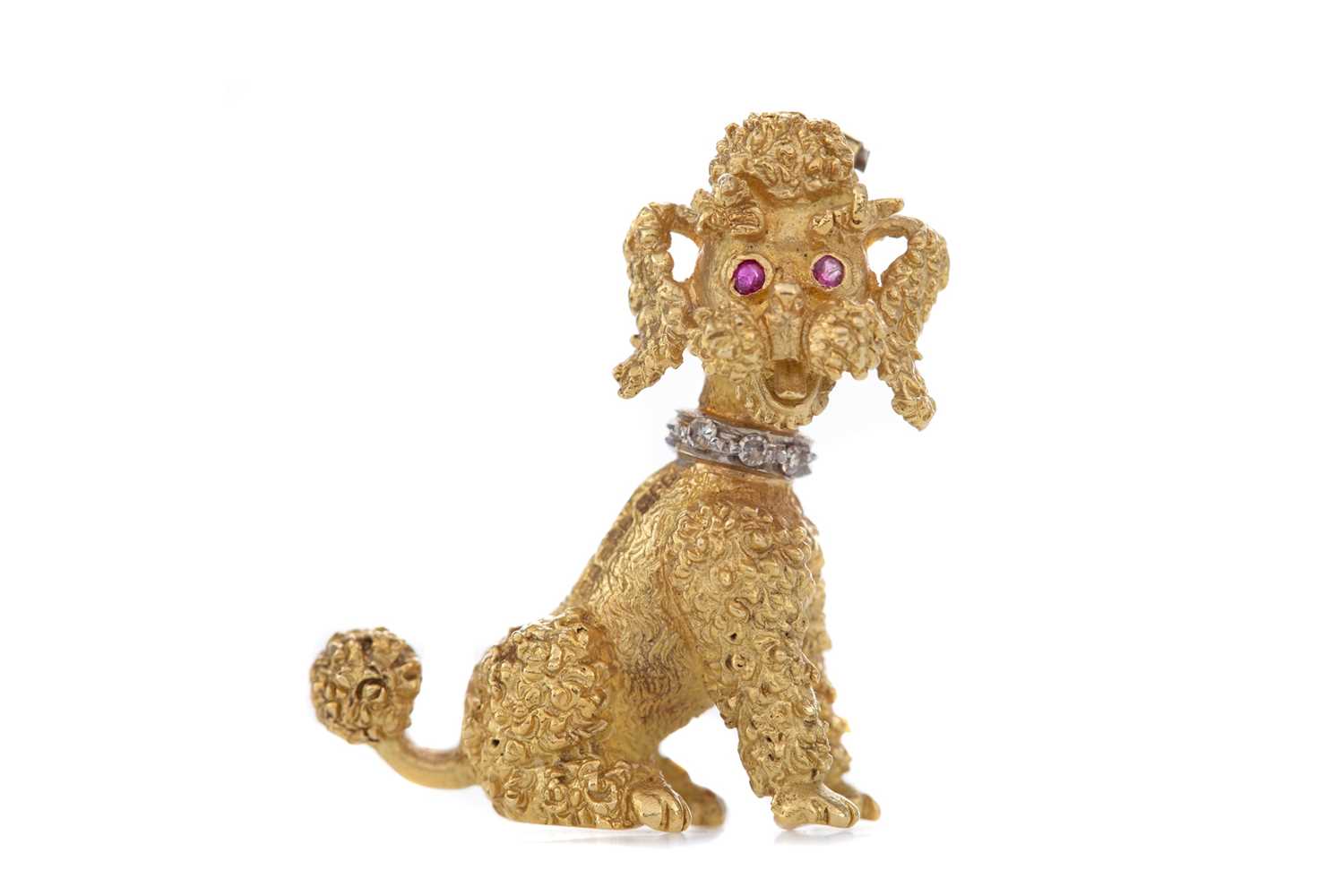 Lot 317 - RUBY AND DIAMOND SET POODLE BROOCH