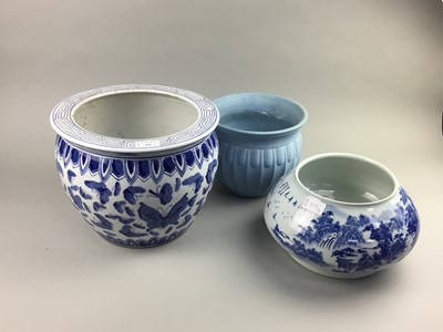 Lot 519 - A BLUE AND WHITE CIRCULAR PLANTER AND TWO OTHERS