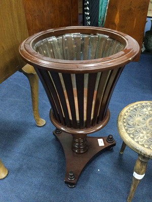 Lot 509 - A REPRODUCTION REGENCY STYLE MAHOGANY URN SHAPED PLANTER, MILKING STOOL AND A TABLE