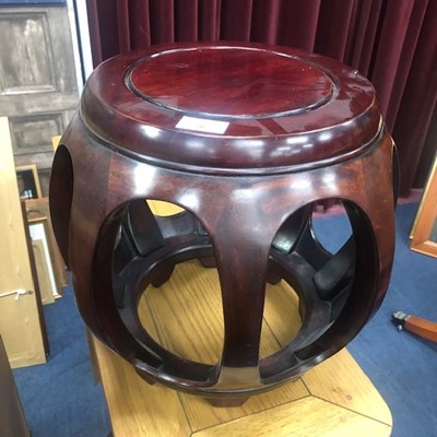 Lot 507 - A CHINESE HARDWOOD BARREL SHAPED OCCASIONAL TABLE