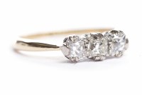 Lot 132 - THREE STONE DIAMOND RING set with three old...