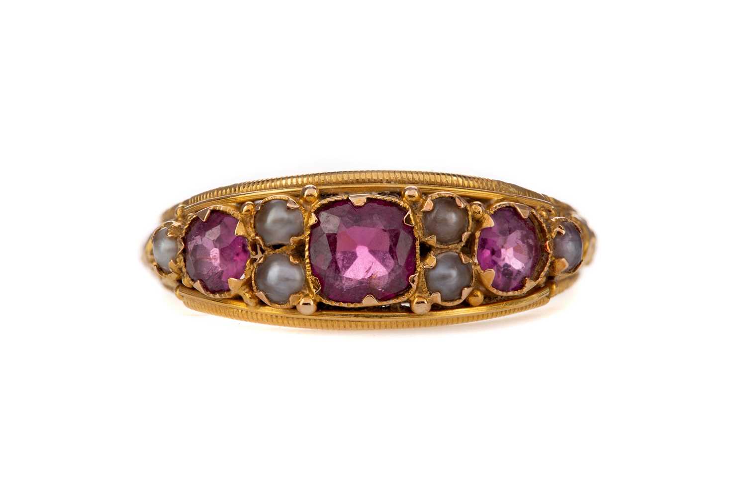Lot 348 - AN AMETHYST AND PEARL RING