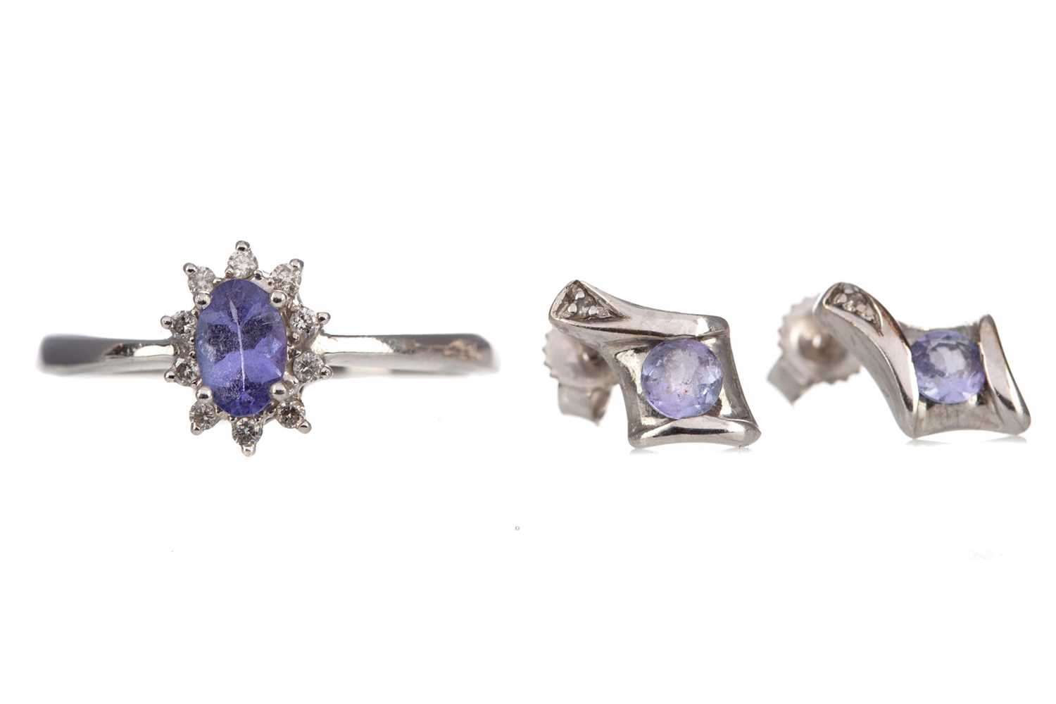 Lot 372 - TANZANITE FLOWER CLUSTER RING ALONG WITH A PAIR OF GEM SET EARRINGS