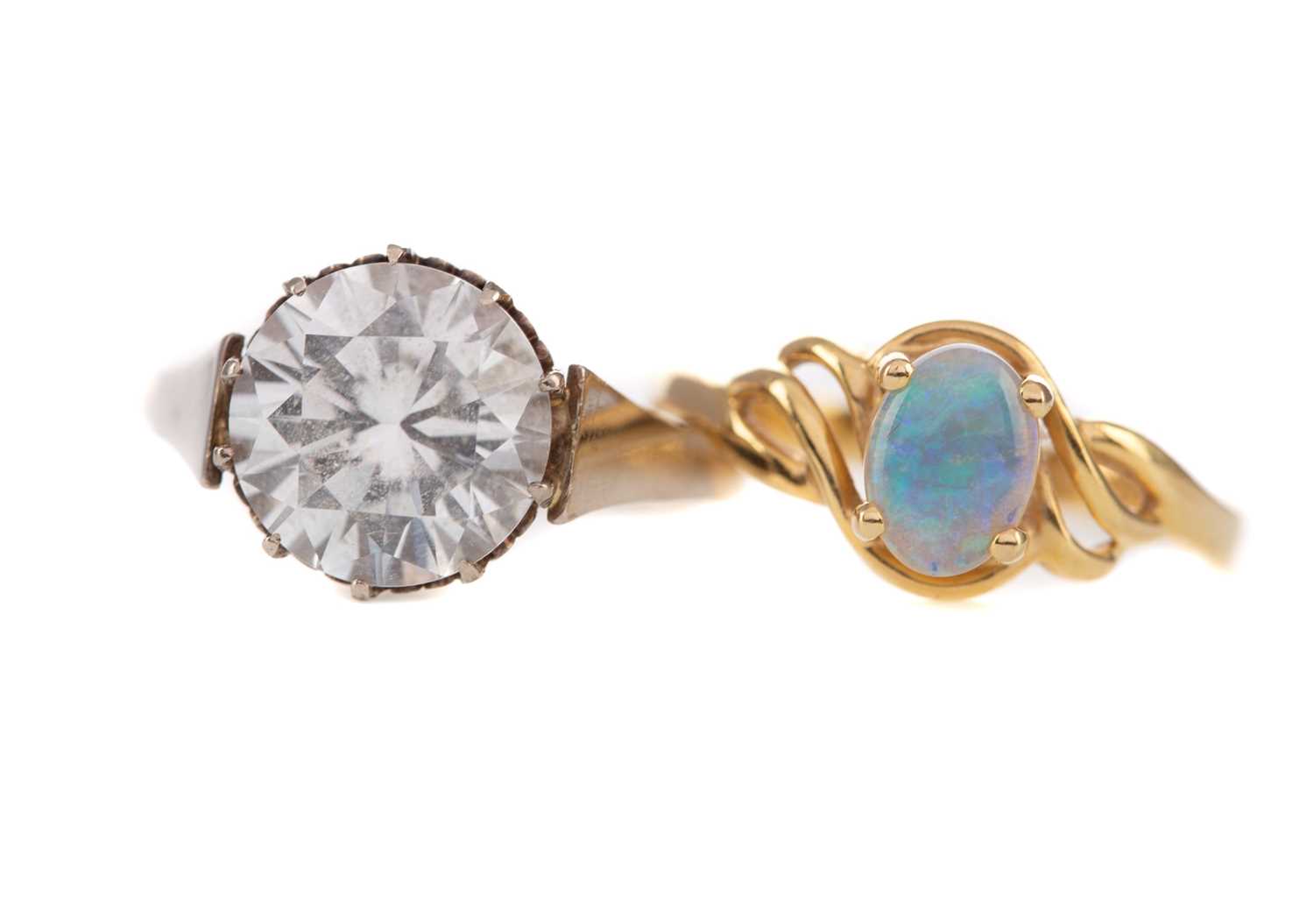 Lot 410 - AN OPAL RING AND A LARGE GEM SET RING