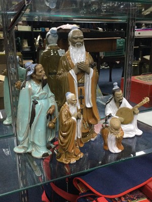 Lot 584 - A CHINESE FIGURE OF A SCHOLAR AND FOUR OTHER SIMILAR FIGURES