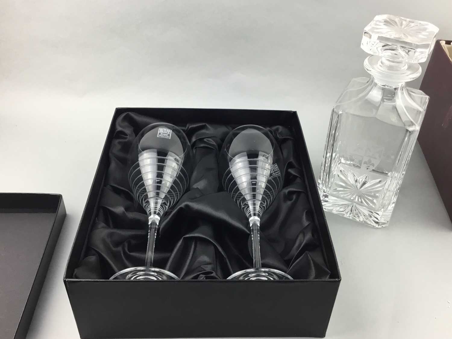 Lot 22 - A CASED PAIR OF WINE GLASSES ALONG WITH A DECANTER