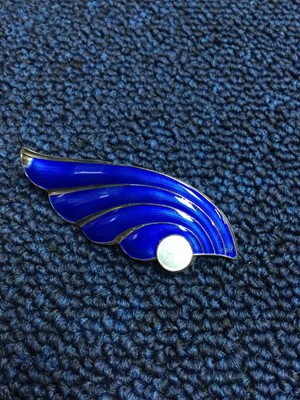 Lot 14 - A LOT OF THREE SCANDINAVIAN SILVER AND ENAMEL BROOCHES