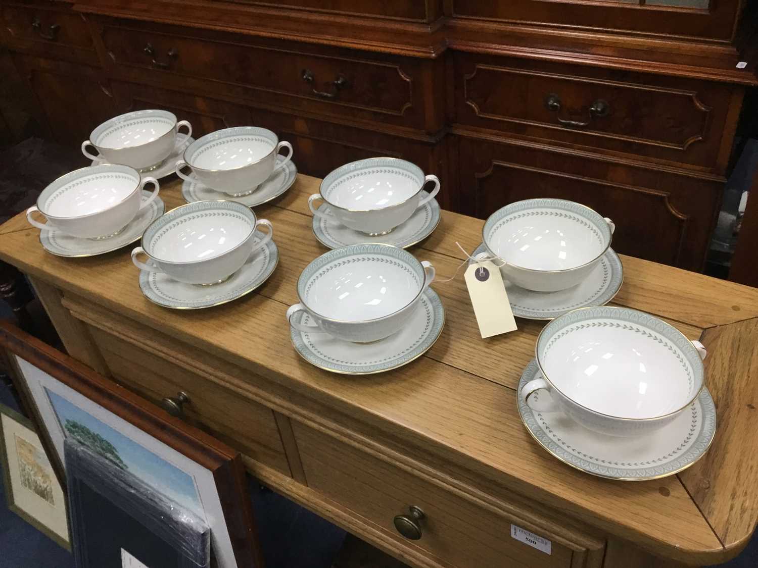 Lot 312 - A SET OF EIGHT ROYAL DOULTON SOUP BOWLS AND STANDS