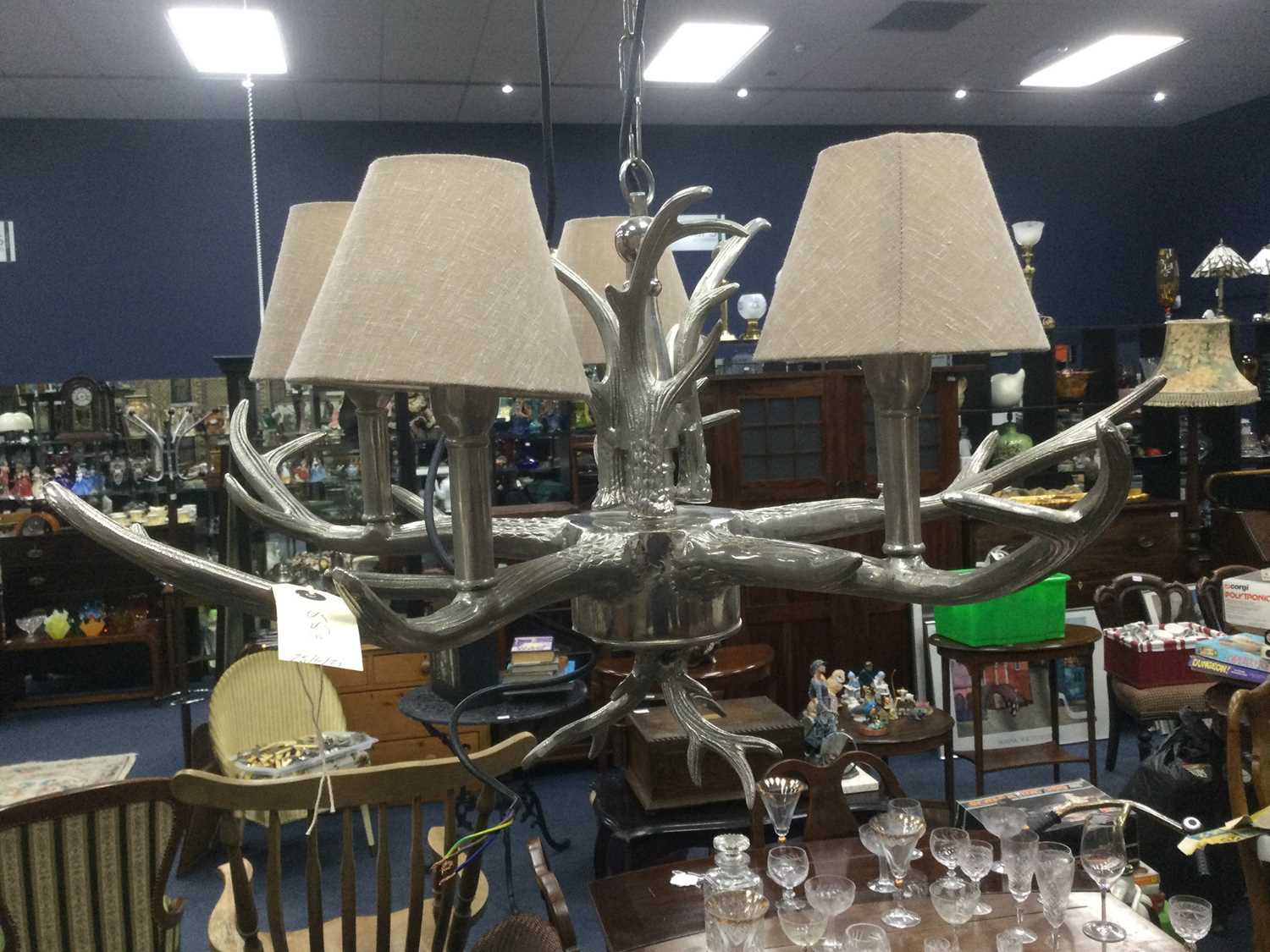 Lot 55 - A CONTEMPORARY STAINLESS STEEL CEILING LIGHT
