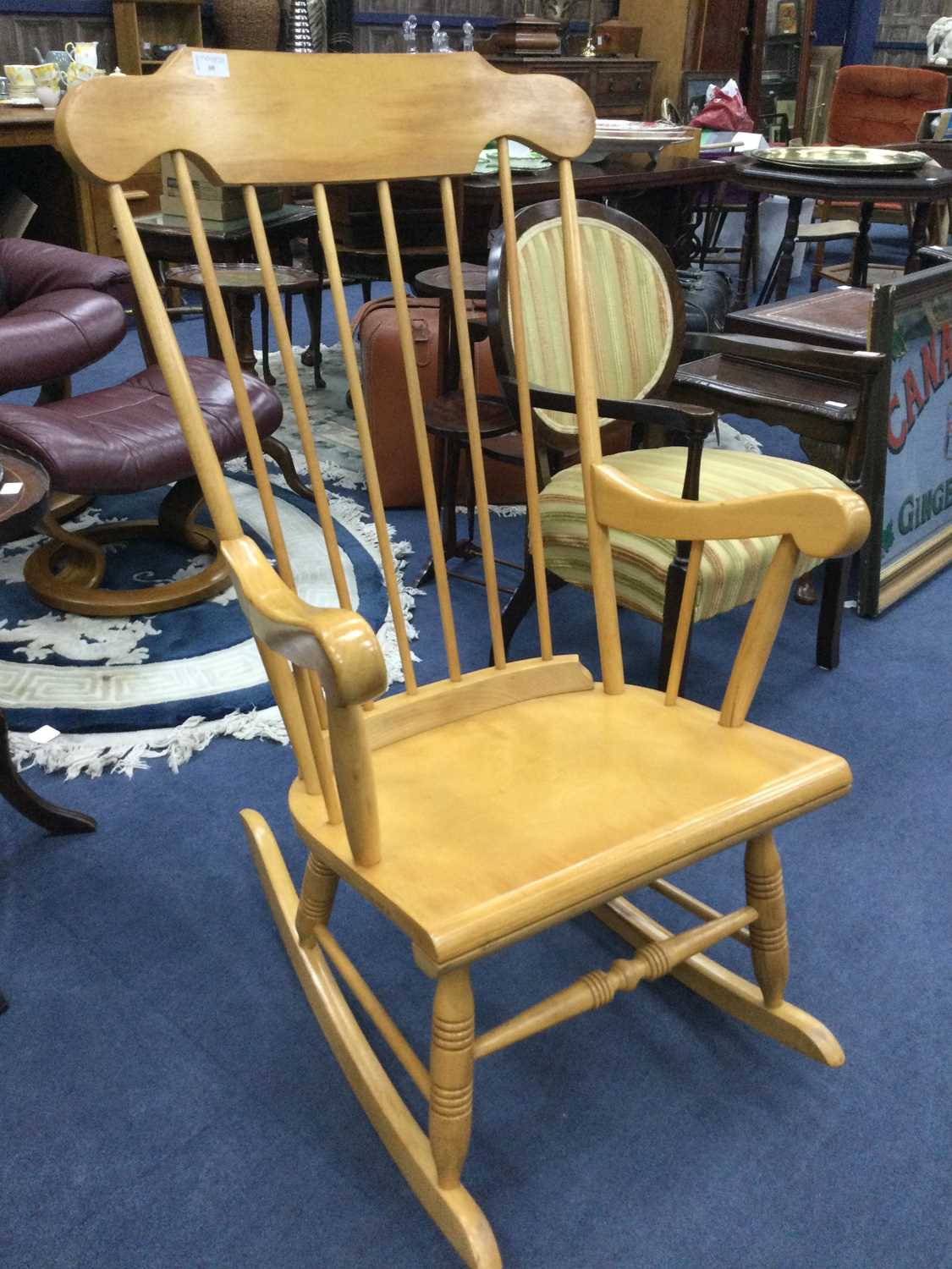 Lot 60 - A ROCKING CHAIR