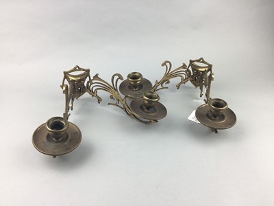 Lot 74 - A PAIR OF EARLY 20TH CENTURY BRASS TWIN WALL SCONCES