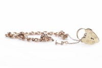 Lot 168 - NINE CARAT ROSE GOLD CURB LINK BRACELET with a...