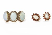 Lot 174 - OPAL DOUBLET SET RING with three oval opal...