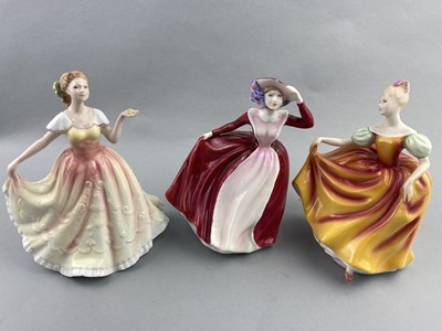 Lot 111 - A ROYAL DOULTON FIGURE OF 'AUTUMN ATTRACTION' AND FIVE OTHERS
