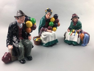 Lot 113 - A ROYAL DOULTON FIGURE OF 'OLD BALLOON SELLER' AND THREE OTHERS