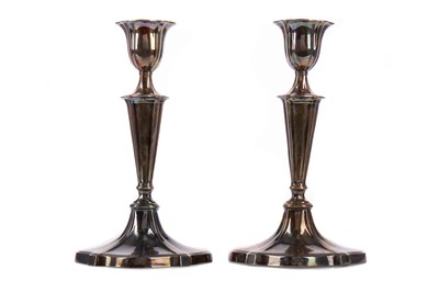 Lot 404 - A PAIR OF EDWARDIAN SILVER CANDLE STICKS