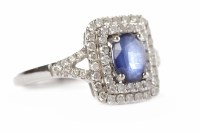 Lot 191 - SAPPHIRE AND DIAMOND CLUSTER RING the central...