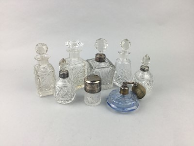 Lot 147 - A GROUP OF GLASS PERFUME BOTTLES AND ATOMISERS
